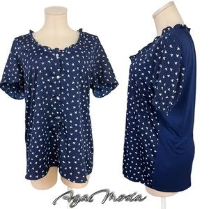 DOLAN for Anthropologie dark blue top with white bird pattern in the front